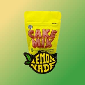 Lemonade Cake Mix branded packaging with bold yellow and red colors.